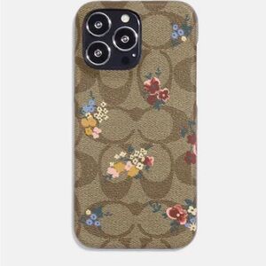 Coach floral print iPhone 14 Pro case